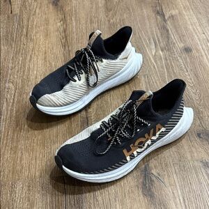 Hoka Black and Cream Athletic Shoes